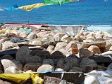 18 Mani Rocks At Seralung Gompa Chorten With Prayer Flags And Lake Manasarovar There are many mani stones next to the prayer flags and chorten at Seralung Gompa.